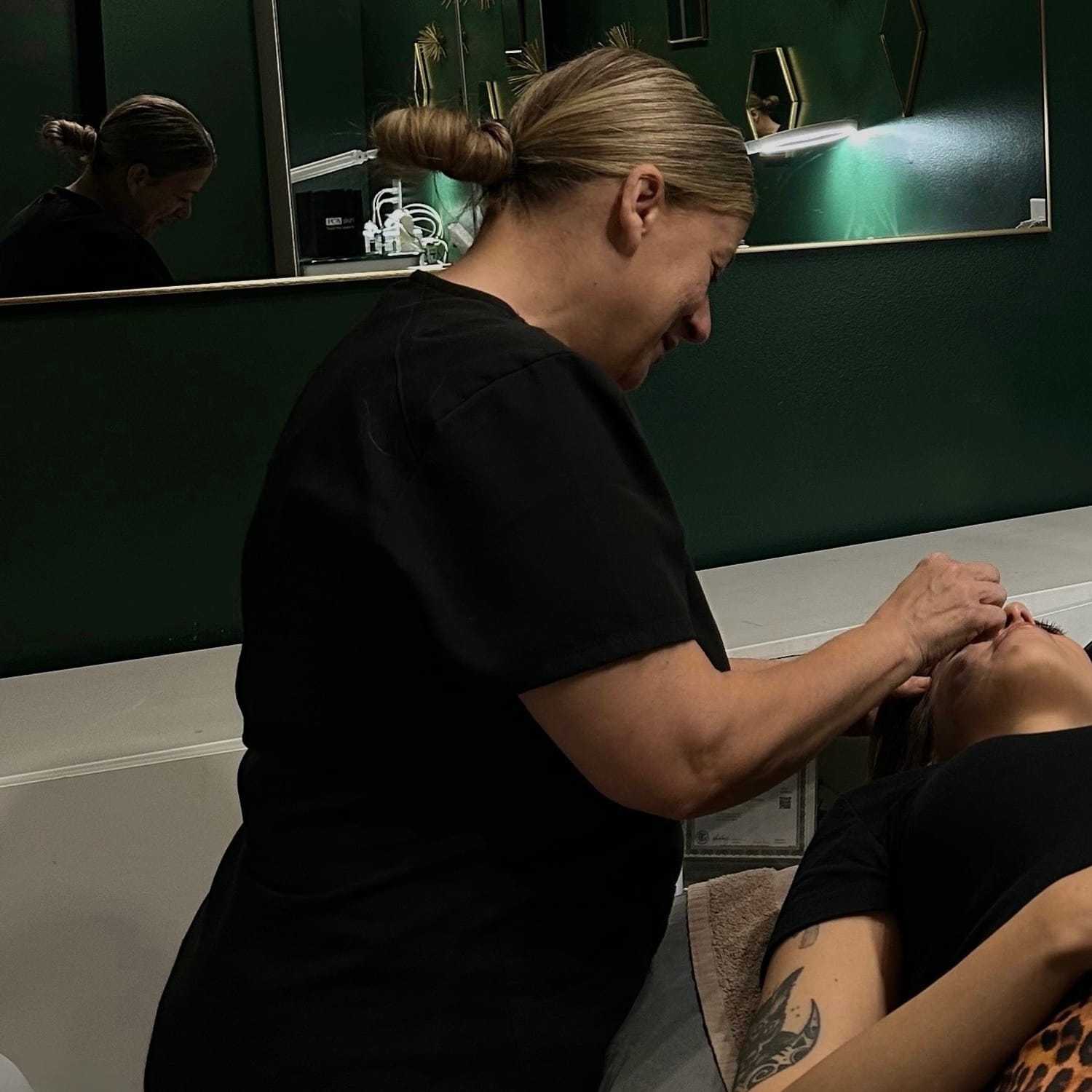 Portrait of Connie, a professional stylist at Mitchell & Co. Salon and Spa, showcasing their expertise and style.