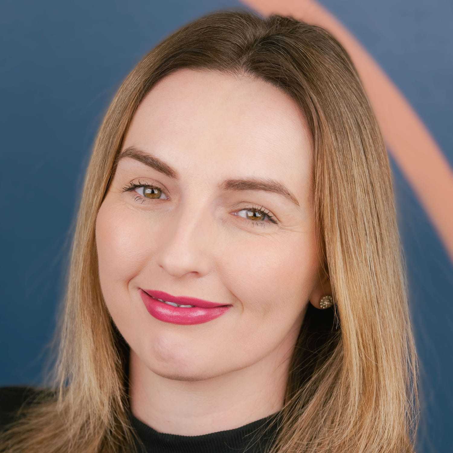 Portrait of Beata, a professional stylist at Mitchell & Co. Salon and Spa, showcasing their expertise and style.