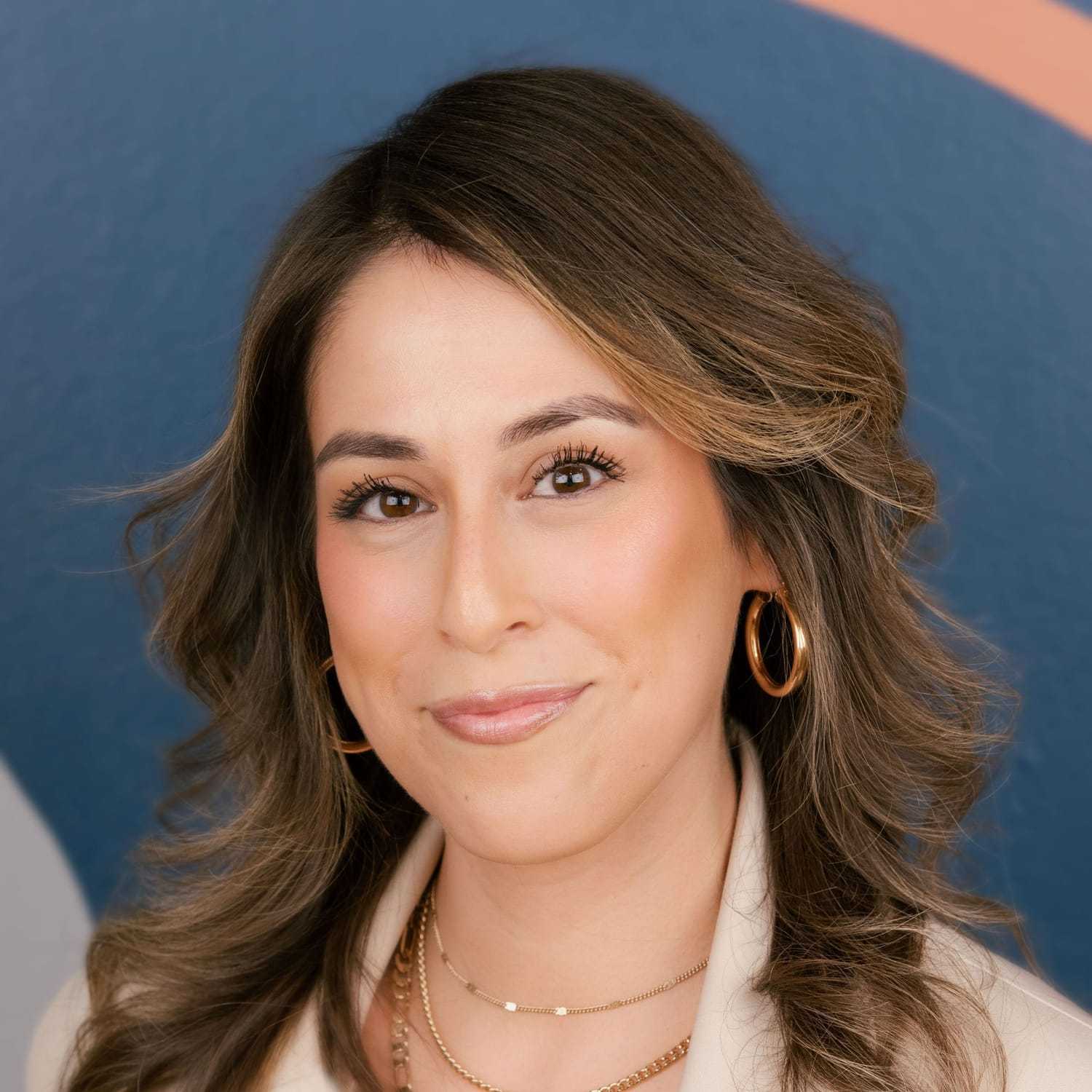 Portrait of Nancy, a professional stylist at Mitchell & Co. Salon and Spa, showcasing their expertise and style.